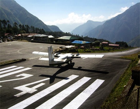 a plane is ready for taking off from lukla airport to kathmandu