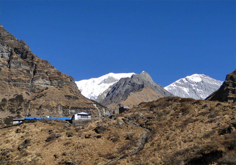 machhapuchchhre base camp, snow-capped high mountains on the background
