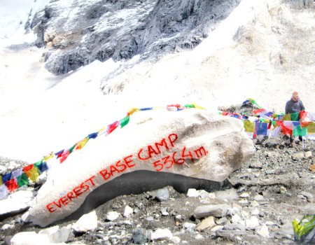 everest base camp written on a big stone on the khumbu glacier
