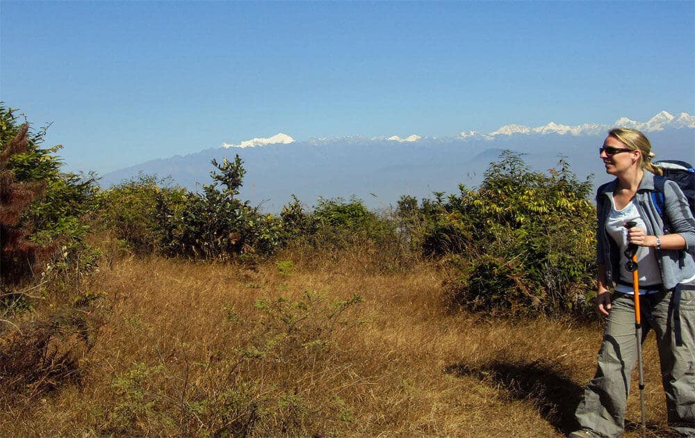 hiker on champadevi hiking trail and beautiful view of the mountains.