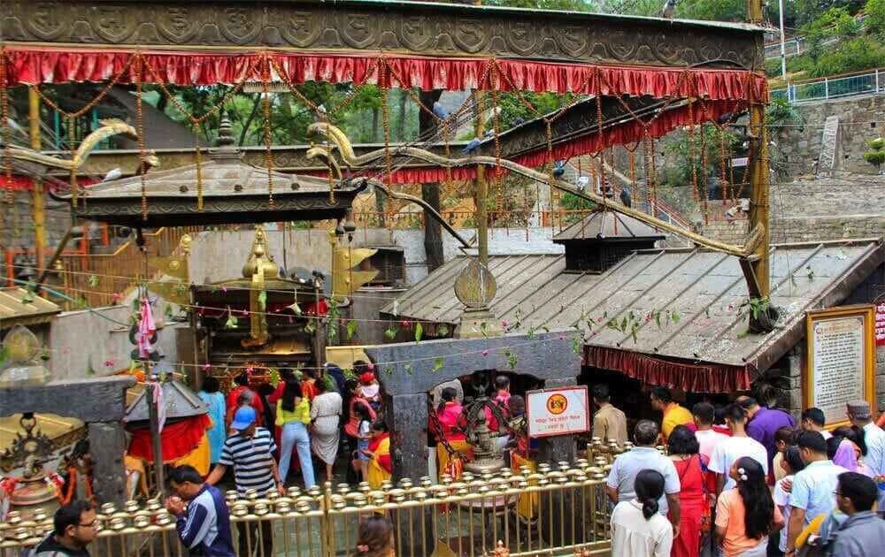 dakshinkali temple and pilgrims on dakshinkali pharping tour.