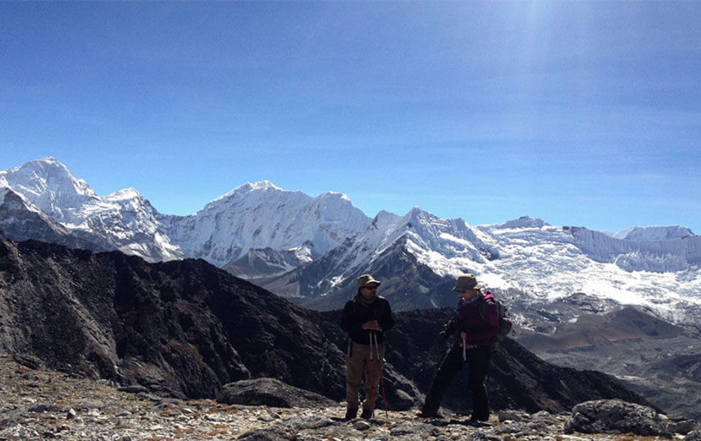 mt.makalu and other beautiful mountain views of everest himalayas from kongma la pass with blue sky on a clear day in everest high passes trek.