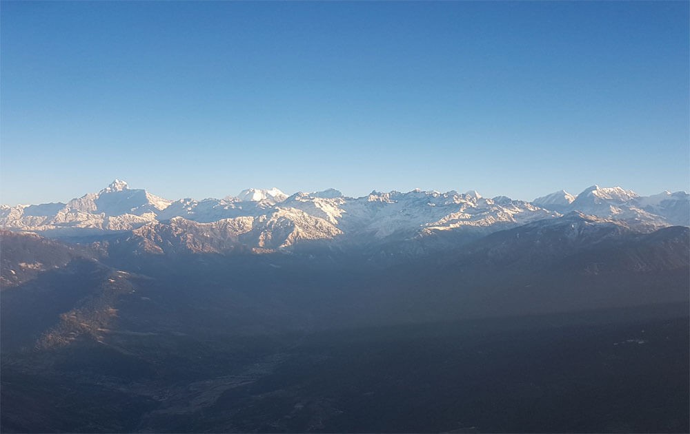 stunning mountain view from plane on everest mountain flight
