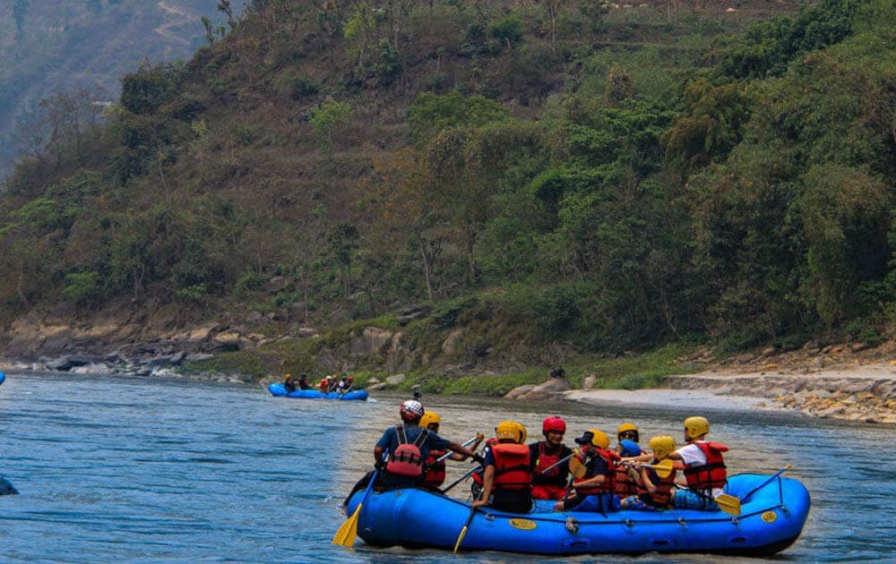 people on the raft during trishuli river rafting
