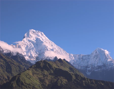 annapurna south and hiuchuli with blue sky on a clear day